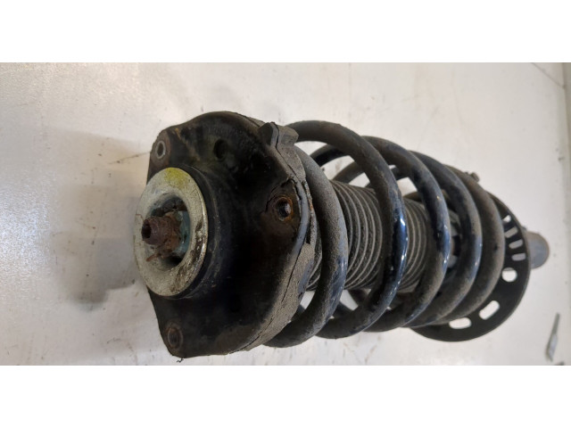 Стойка амортизатора Volkswagen Caddy 2004-2010