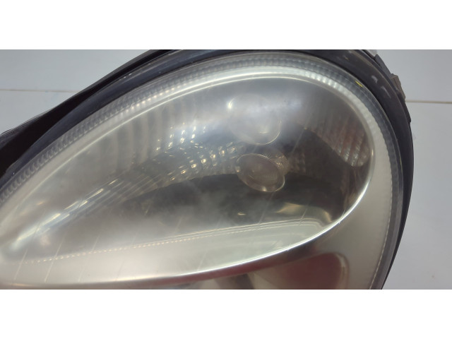 Фара передняя Mercedes E W211 2002-2009 левая