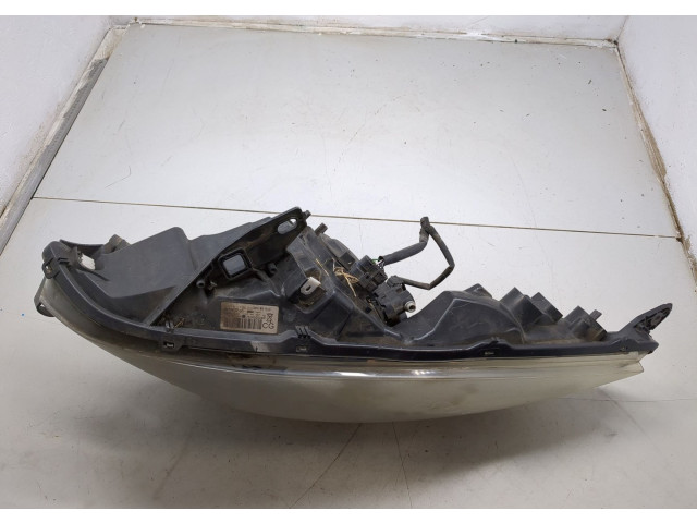 Фара передняя  Renault Scenic 2009-2012 левая 