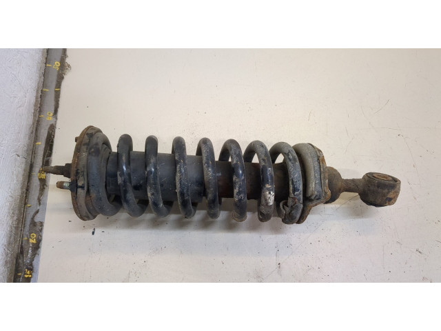 Стойка амортизатора Nissan Pathfinder 2004-2014