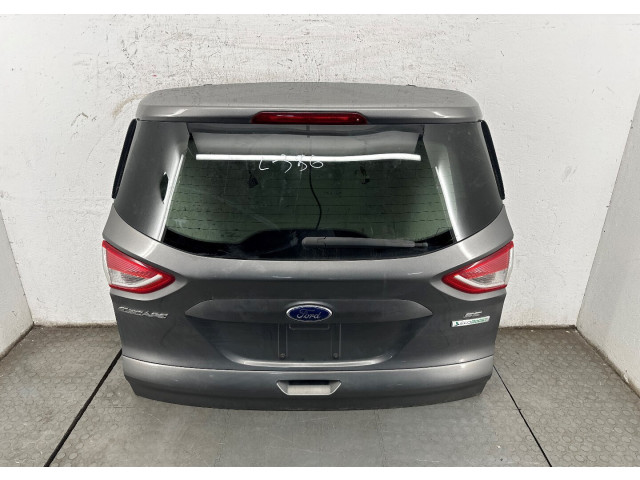 Замок багажника  Ford Escape 2012-2015       