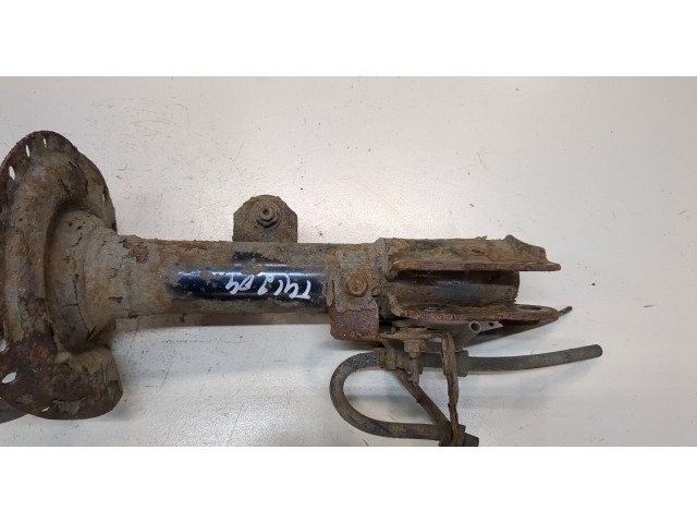 Стойка амортизатора Mitsubishi Outlander 2012-2015 гибрид