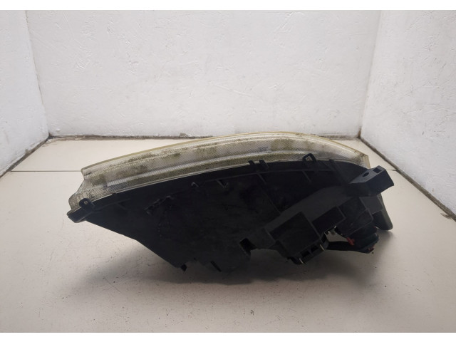 Фара передняя Toyota Corolla E12 2001-2006 левая