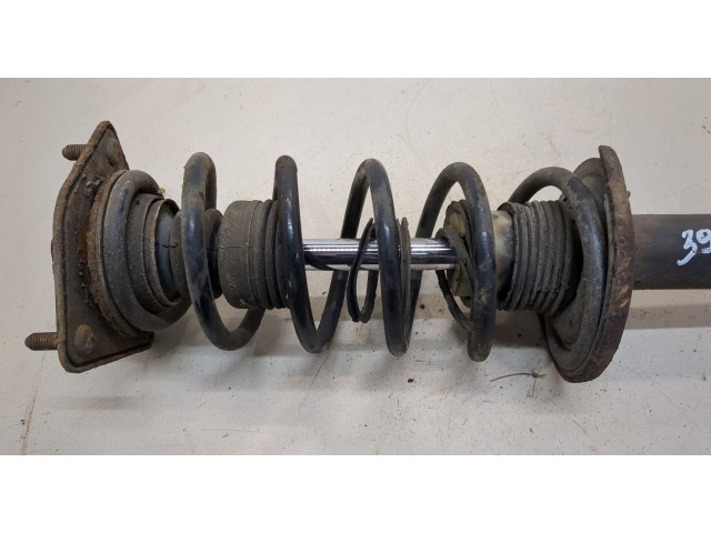 Стойка амортизатора  Mitsubishi Colt 2004-2008      