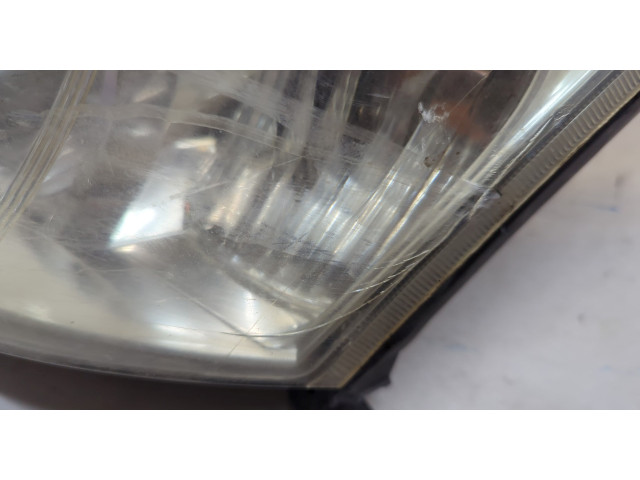 Фара передняя  Toyota Corolla E12 2001-2006 левая 