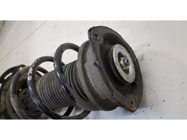 Стойка амортизатора Skoda Octavia (A7) 2017-2021