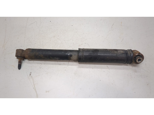 Стойка амортизатора Nissan Pathfinder 2004-2014 2.5 дизель