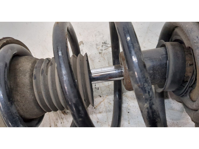 Стойка амортизатора Mitsubishi Outlander 2012-2015