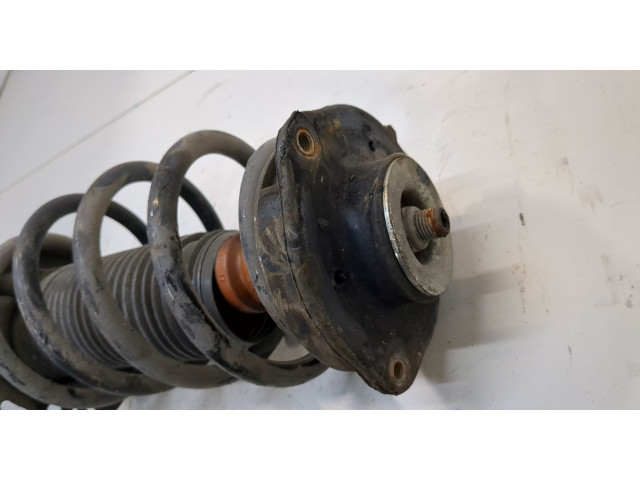 Стойка амортизатора  Volkswagen Caddy 2004-2010 1T0413031HQ, 1K0411105EH     