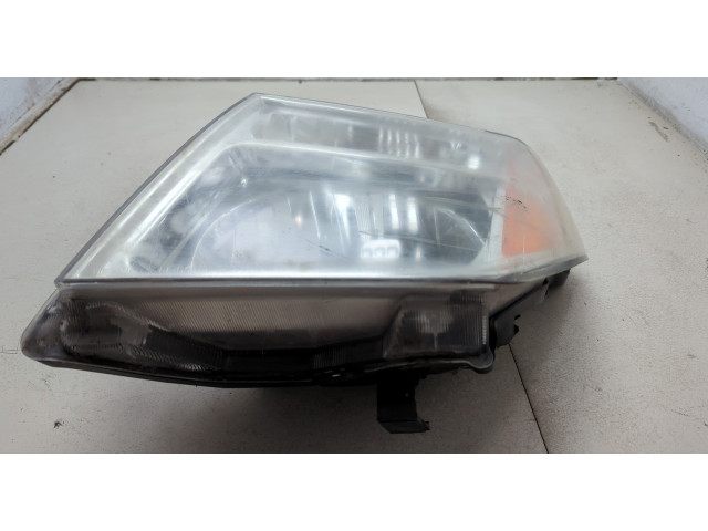 Фара передняя Nissan Pathfinder 2004-2014 левая