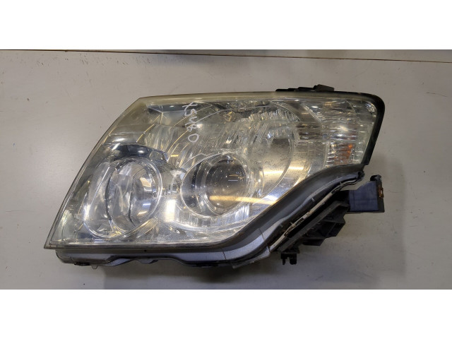 Фара передняя Mitsubishi Pajero 2006-2011 левая