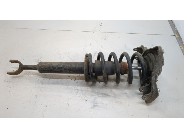 Стойка амортизатора  Skoda SuperB 2001-2008      