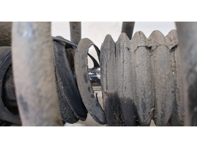 Стойка амортизатора  Nissan X-Trail (T30) 2001-2007 54302EQ025, 54010EQ02B     