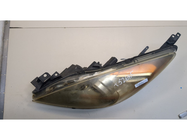 Фара передняя Mazda 3 (BL) 2009-2013 левая