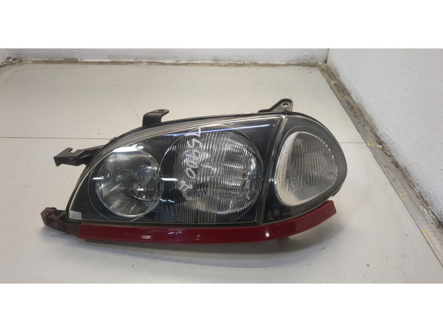 Фара передняя  Toyota Avensis 1 1997-2003 левая 