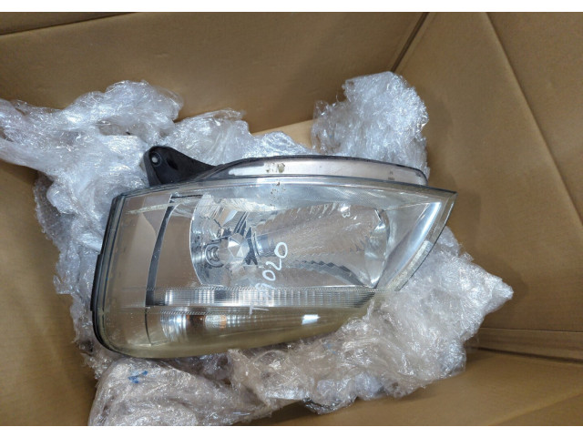 Фара передняя  Peugeot Partner 2002-2008 левая 