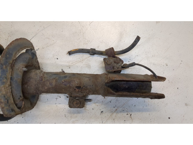 Стойка амортизатора Jeep Patriot 2010-