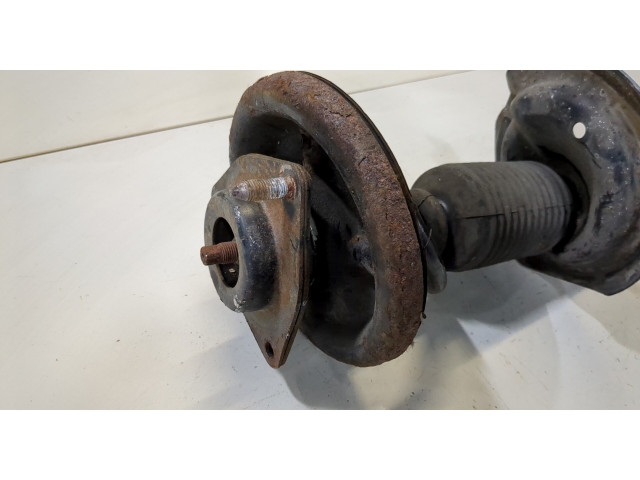 Стойка амортизатора Mitsubishi Outlander XL 2006-2012