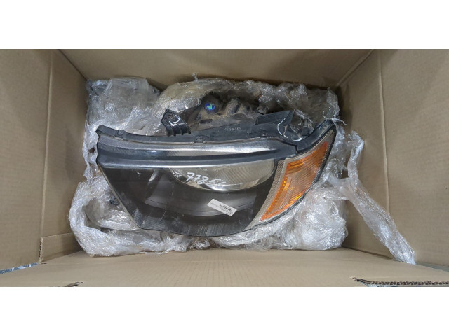 Фара передняя Mitsubishi L200 2006-2015 левая