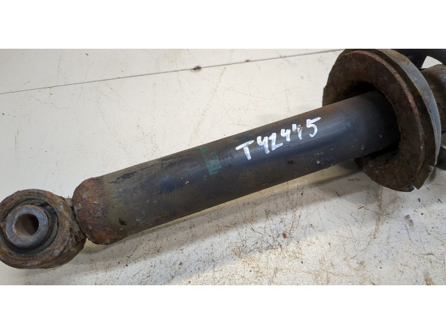 Стойка амортизатора Mitsubishi Pajero 2006-2011 4062A024, 4040A068