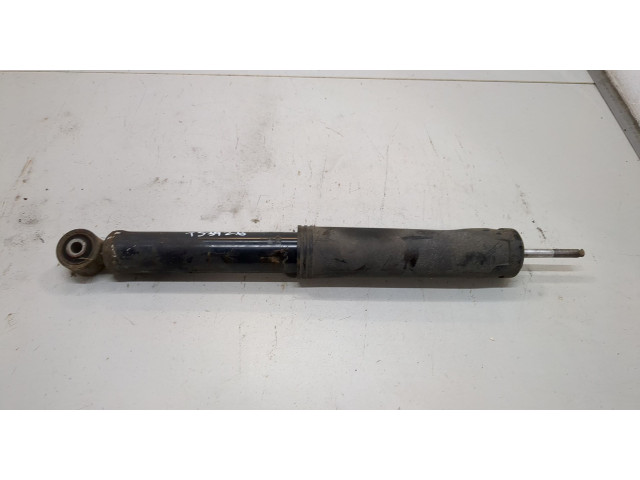 Стойка амортизатора SsangYong Rexton 2006-2012