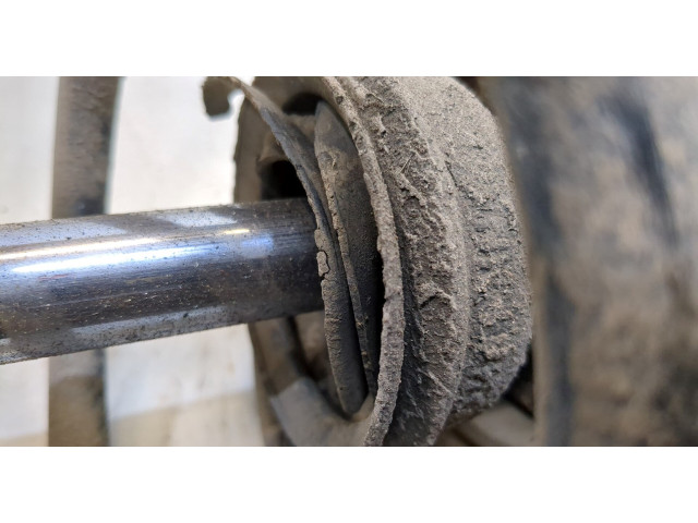 Стойка амортизатора Nissan X-Trail (T30) 2001-2006