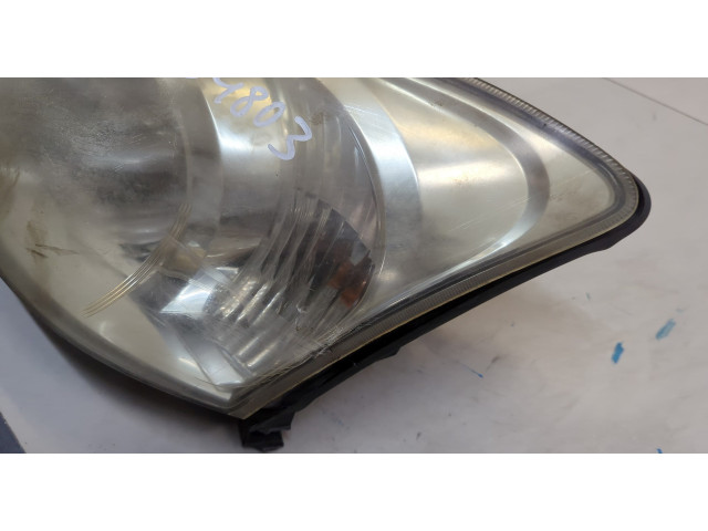 Фара передняя  Toyota Corolla E12 2001-2006 левая 