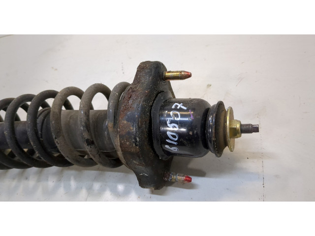 Стойка амортизатора Mitsubishi Lancer 9 2003-2006