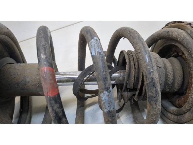 Стойка амортизатора  Nissan X-Trail (T30) 2001-2006      