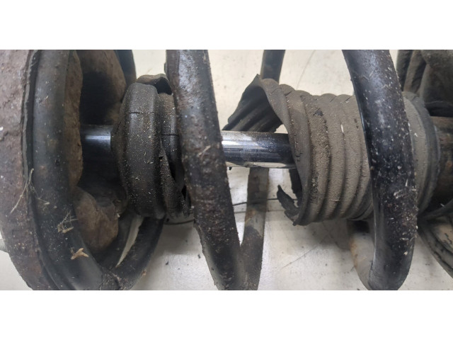 Стойка амортизатора Mitsubishi Outlander XL 2006-2012 4060A174, 4040A098 2.2 дизель