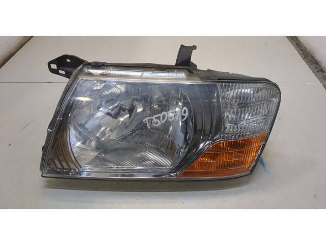 Фара передняя Mitsubishi Pajero / Montero 2000-2006 левая