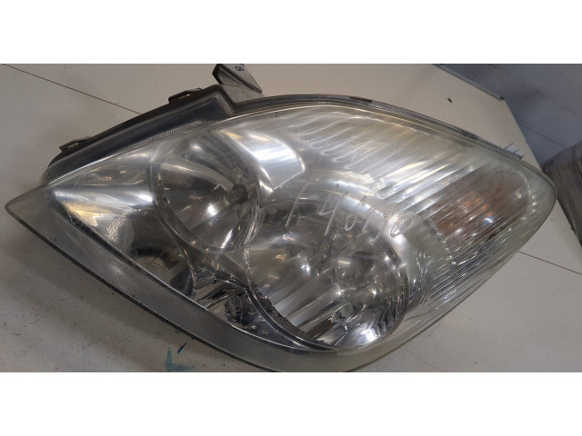 Фара передняя Toyota Corolla Verso 2002-2004 левая