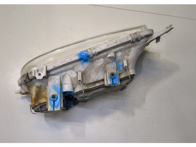 Фара передняя  Ford Fiesta 1995-2000 левая 