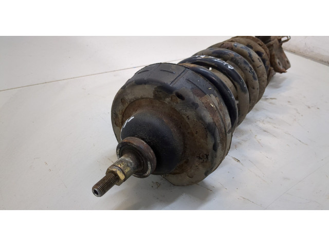 Стойка амортизатора Renault Trafic 2001-2014