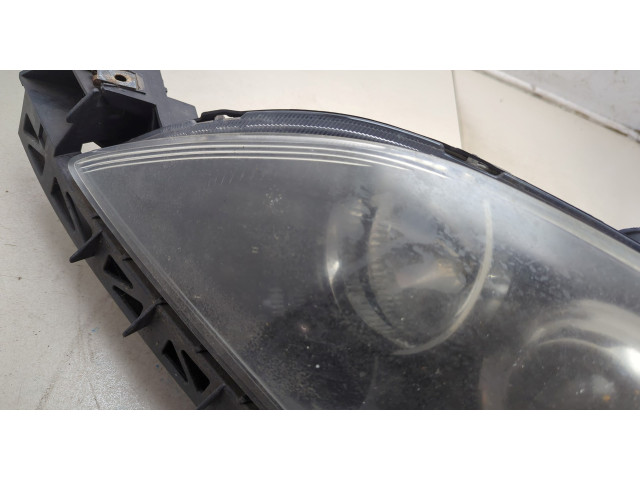Фара передняя Mazda 3 (BK) 2003-2009 левая