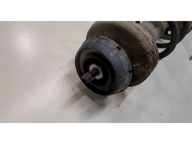 Стойка амортизатора Dacia Logan 2004-2012