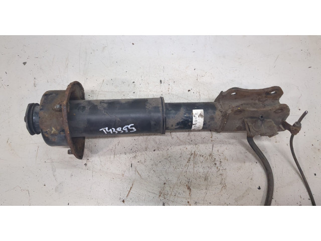 Стойка амортизатора  Suzuki Grand Vitara 1997-2005      