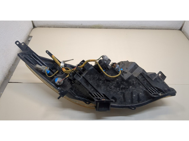 Фара передняя Mazda 3 (BL) 2009-2013 левая