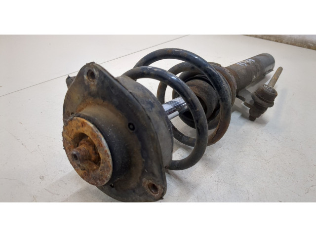 Стойка амортизатора Volkswagen Caddy 2004-2010