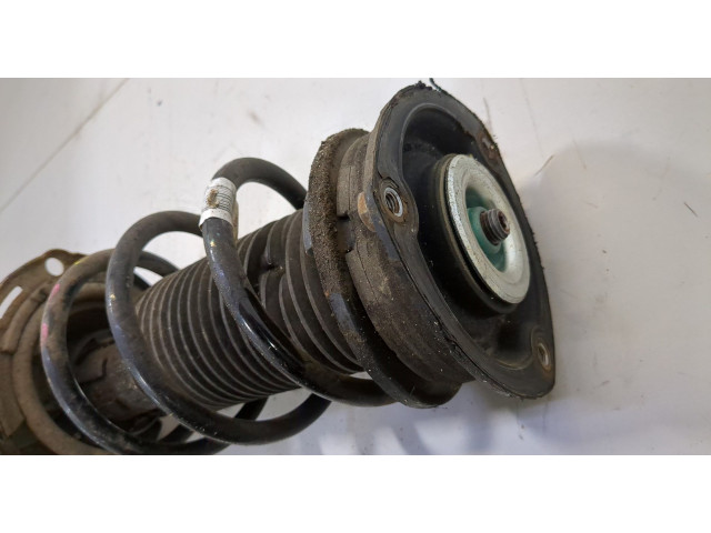 Стойка амортизатора  Seat Leon 3 2012-2020 5Q0413023HT, 5Q0411105CE     