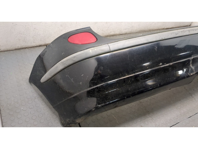 Бампер Nissan Almera Tino задний