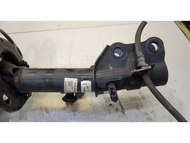 Стойка амортизатора  Mazda CX-9 2016-      