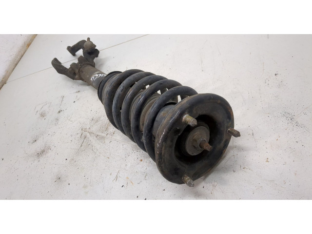 Стойка амортизатора Mitsubishi Galant 1997-2003