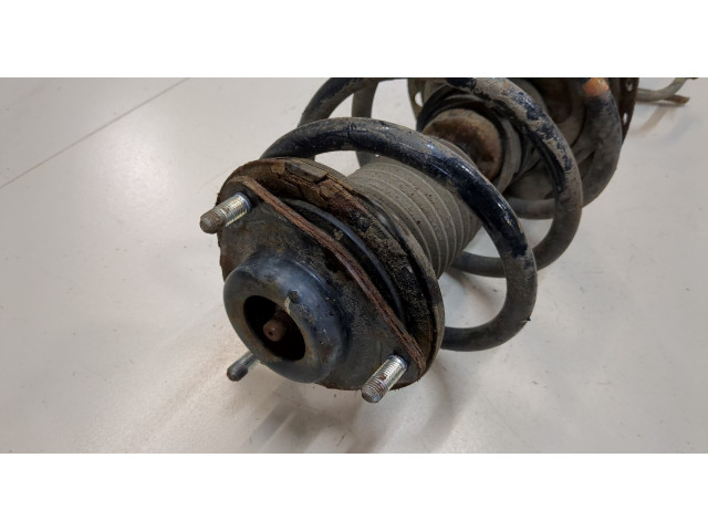 Стойка амортизатора Mitsubishi Outlander 2012-2015 гибрид