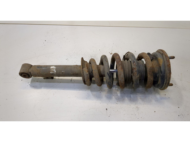 Стойка амортизатора Mitsubishi L200 2006-2015