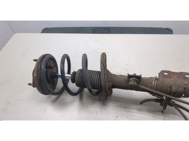 Стойка амортизатора Mitsubishi Outlander XL 2006-2012