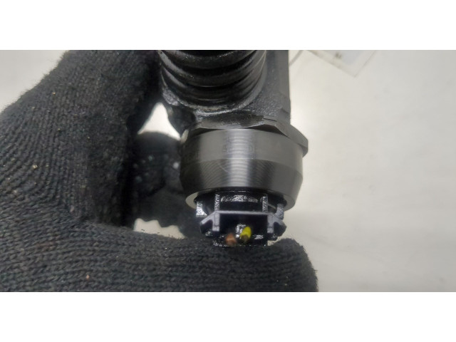 Форсунка топливная Volkswagen Golf Plus 038130073AG