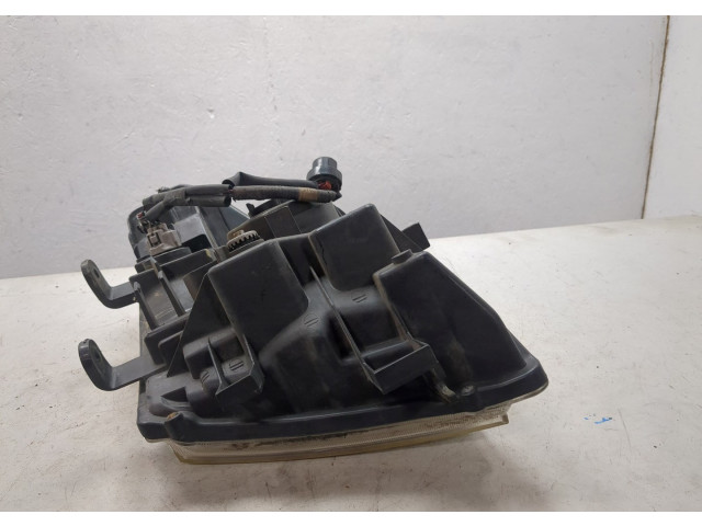 Фара передняя Nissan Pathfinder 2004-2014 правая