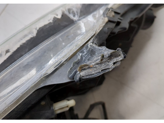 Фара передняя  Renault Scenic 2009-2012 левая 