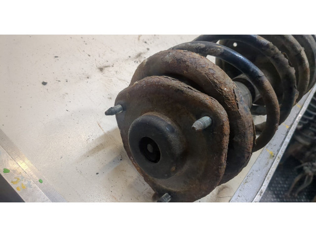 Стойка амортизатора Mitsubishi Carisma